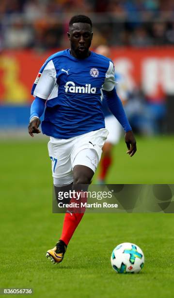 Kingsley Schindler of Kiel runs with the ball during the Second Bundesliga match between Holstein Kiel and SpVgg Greuther Fuerth at Holstein-Stadion...