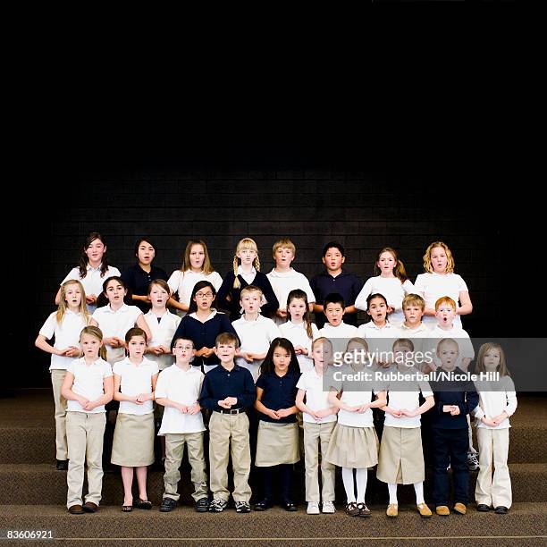 children in a choir - boy singing stock pictures, royalty-free photos & images