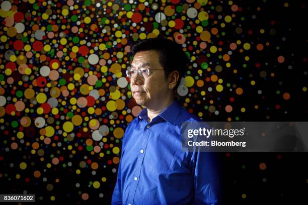 Kai-Fu Lee, founder of Sinovation Ventures, poses for a photograph in Beijing, China, on Tuesday, Aug. 15, 2017. Sinovation Ventures' latest growing...