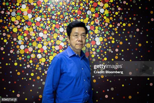 Kai-Fu Lee, founder of Sinovation Ventures, poses for a photograph in Beijing, China, on Tuesday, Aug. 15, 2017. Sinovation Ventures' latest growing...