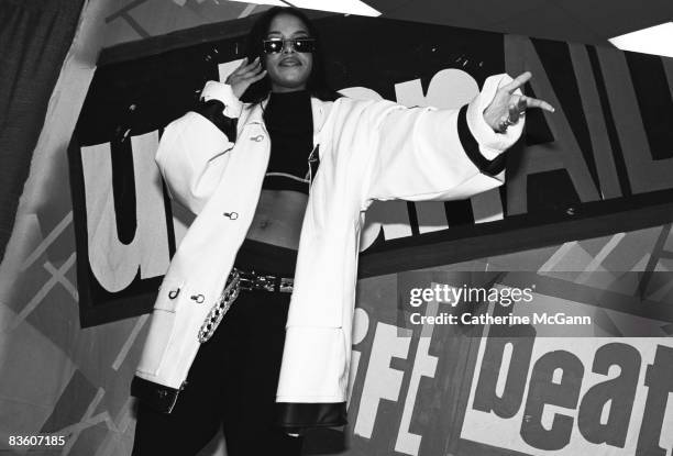 American R&B singer Aaliyah, aka Aaliyah Dana Houghton poses for a photo backstage at Madison Square Garden for Lifebeat's Urban Aid benefit concert...