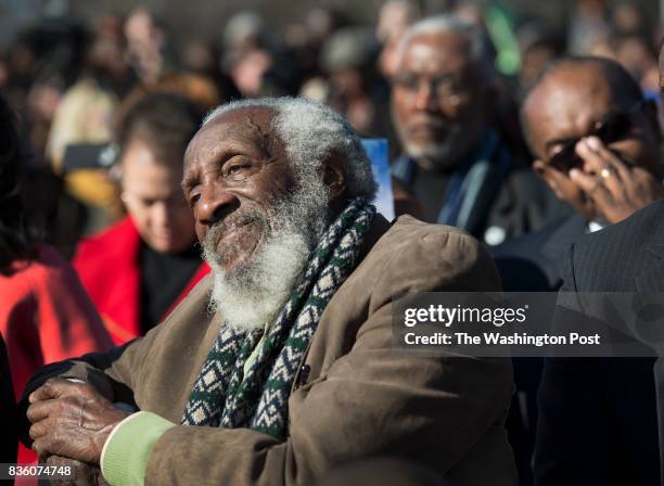 Actor Dick Gregory listens to speeches at the Wreath-Laying Ceremony at the Martin Luther King Jr. Memorial in Washington, DC on January 20, 2013....