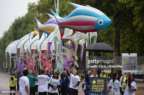 Greenpeace protestors make their way down The Mall as they take part in a parade of inflatable sea creatures on August 21, 2017 in London, England....