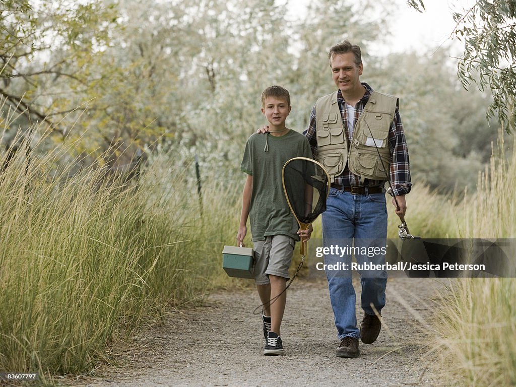 Father and son going fishing.