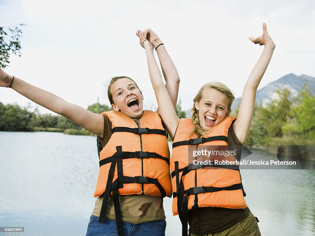 Two girls in life vests