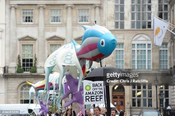 Greenpeace protestors arrive in St. Jame's Square at the BP headquarters as they take part in a parade of inflatable sea creatures on August 21, 2017...