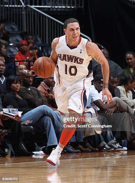 Mike Bibby of the Atlanta Hawks drives against the Toronto Raptors at Philips Arena on November 7, 2008 in Atlanta, Georgia. NOTE TO USER: User...