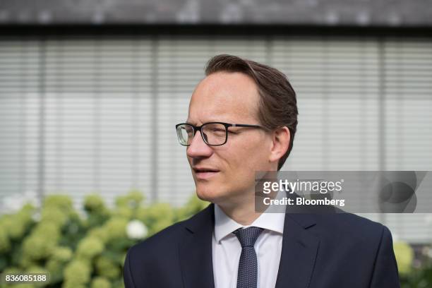 Markus Krebber, chief financial officer of RWE AG, poses for a photograph ahead of an interview at the company's offices in Essen, Germany, on...