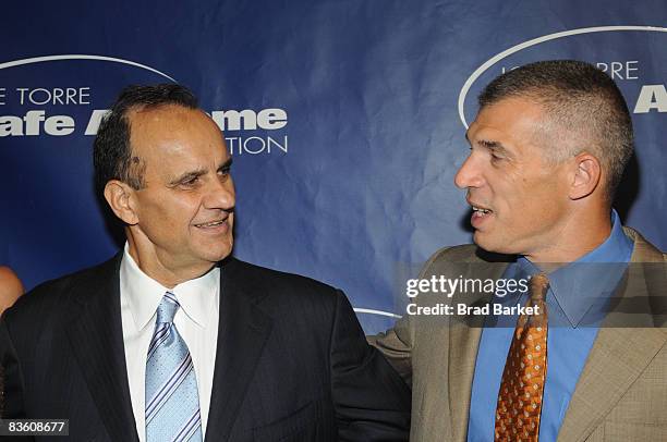 Joe Girardi and Joe Torre attends the 6th annual Joe Torre Safe at Home Foundation Gala at Pier 60 at Chelsea Piers on November 7, 2008 in New York...