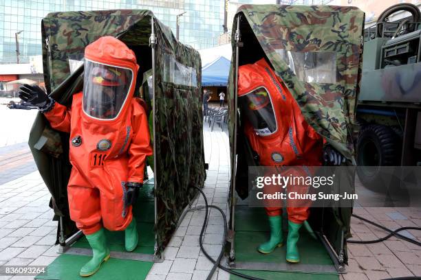 Emergency services personnel wearing protective clothing participate in an anti-terror and anti-chemical terror exercise as part of the 2017 Ulchi...