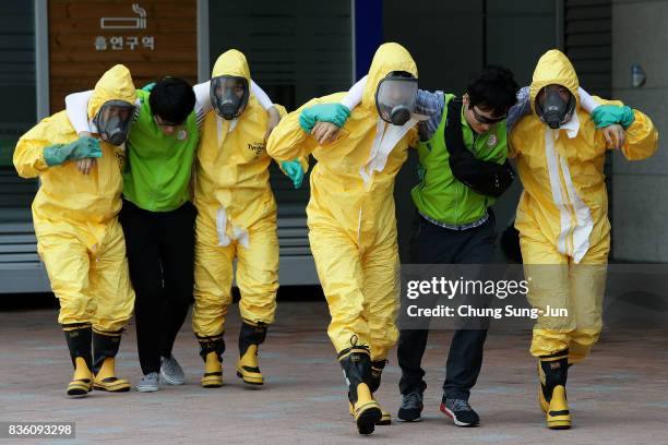 Emergency services personnel wearing protective clothing participate in an anti-terror and anti-chemical terror exercise as part of the 2017 Ulchi...