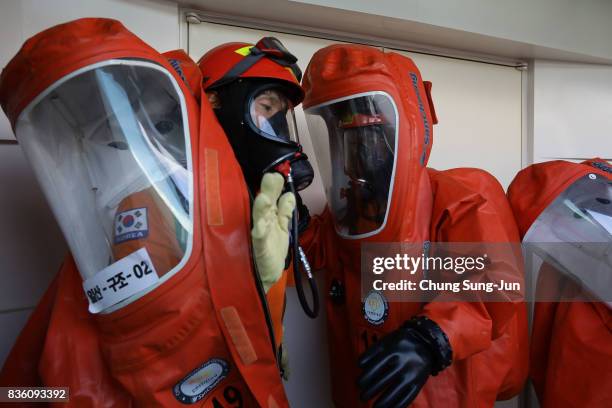 Emergency services personnel wearing protective clothing participate in an anti-terror and anti-chemical terror exercise as part of the 2017 Ulchi...