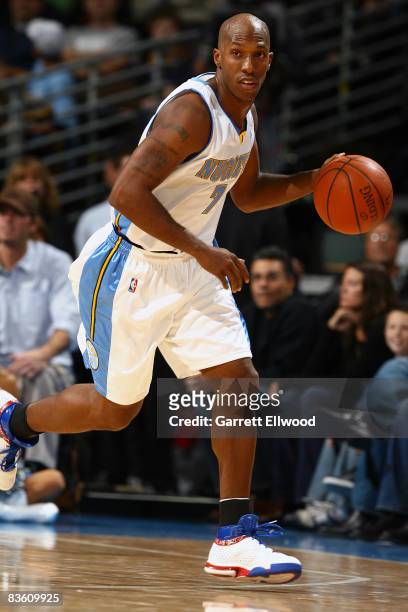 Chauncey Billups of the Denver Nuggets brings the ball up court against the Dallas Mavericks on November 7, 2008 at the Pepsi Center in Denver,...