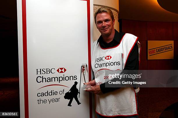 Gareth Lord, caddie for Robert Karlsson, poses with the trophy after being named Caddie Of The Year at the HSBC Champions at Sheshan Golf Club on...