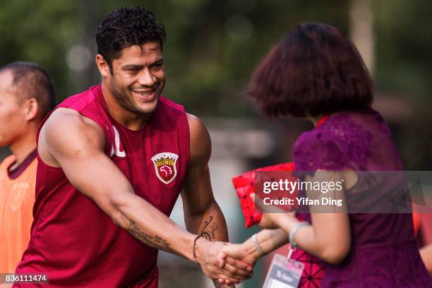 Hulk of Shanghai SIPG shakes hand with Shanghai SIPG officer during pre-match training session of the AFC Champions League 2017 Quarterfinals 1st leg...