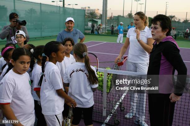 Billie Jean King and Nadia Petrova of Russia talk with children who have just taken part in her tennis mentoring clinic during the Sony Ericsson...