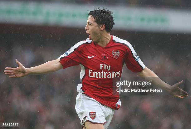 Samir Nasri of Arsenal celebrates scoring their second goal during the Barclays Premier League match between Arsenal and Manchester United at the...