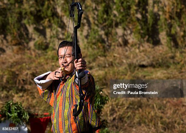 His Majesty Jigme Khesar Namgyel Wangchuck enjoys a game of archery, the national game during the Coronation celebration on November 8, 2008 in...