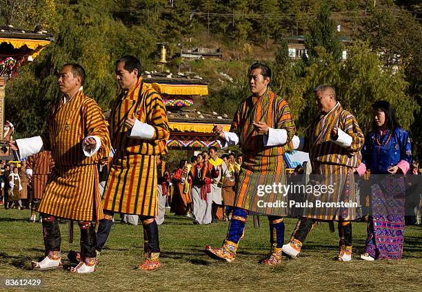 His Majesty Jigme Khesar Namgyel Wangchuck dances along side his father, former King Jigme Singye Wangchuck during the Tashi Lebey at the end of the...