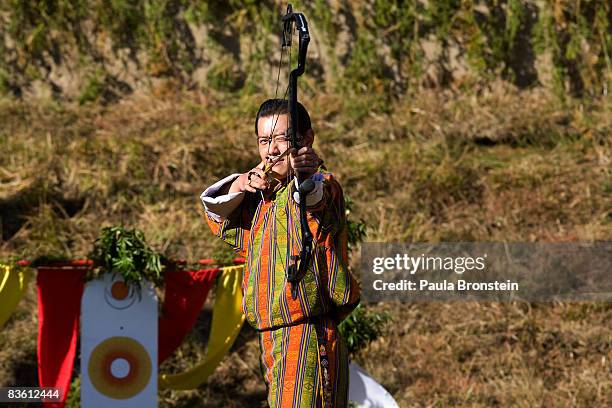 His Majesty Jigme Khesar Namgyel Wangchuck enjoys a game of archery, the national game during the Coronation celebration on November 8, 2008 in...