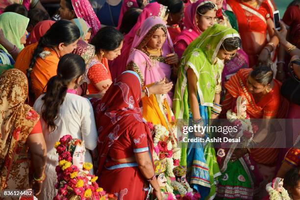 gangaur festival celebrations in udaipur, rajasthan. - gangaur stock pictures, royalty-free photos & images