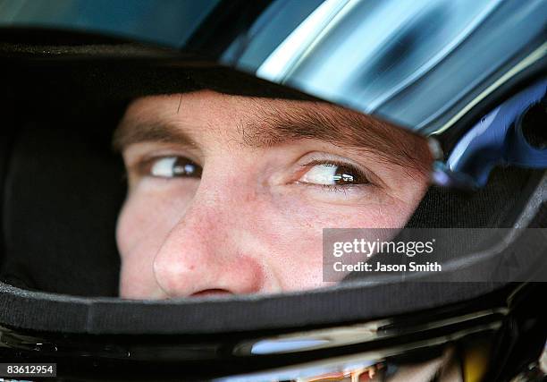 Scott Speed, driver of the Red Bull Toyota, prepares to practice for the NASCAR Sprint Cup Series Checker O'Reilly Auto Parts 500 at Phoenix...