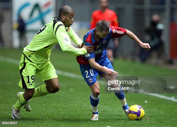 Le Havre's Kevin Anin vies with Caen's Reynald Lemaitre during the French L1 football match Caen vs Le Havre, on November 8 at the Michel-d'Ornano...