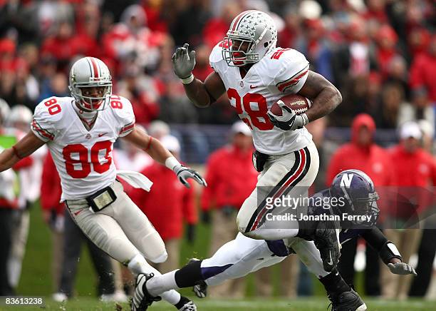 Chris Wells of the Ohio State Buckeyes runs for a touchdown against the Northwestern Wildcats at Ryan Stadium on November 8, 2008 in Evanston,...