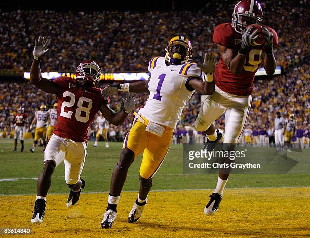 Rashad Johnson of the Alabama Crimson Tide makes an interception on a pass intended for Brandon LaFell of the Louisiana State University Tigers in...