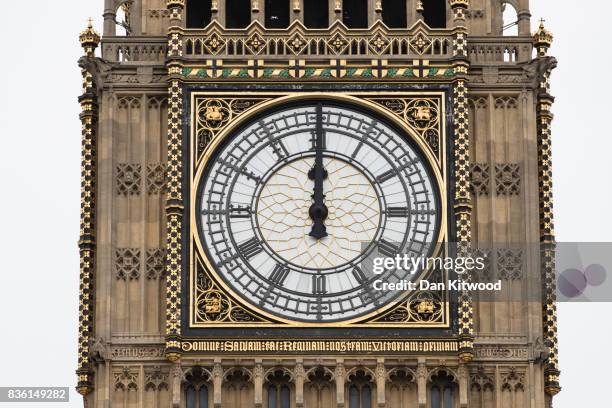 General view of the Elizabeth Tower and clock face as people gather in Parliament Square to listen to the final chimes of Big Ben ahead of a...