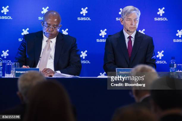Steve Cornell, co-chief executive officer of Sasol Ltd., right, and Bongani Nqwababa, co-chief executive officer of Sasol Ltd., pause during a news...