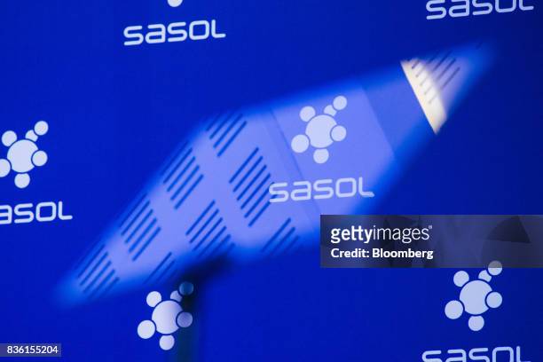 An autocue screen reflects the logo of Sasol Ltd. During a news conference at the company's headquarters in Johannesburg, South Africa, on Monday,...