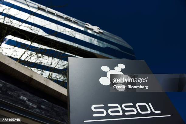 Logo sits on display outside the Sasol Ltd. Headquarters in Johannesburg, South Africa, on Monday, Aug. 21, 2017. Sasol, the worlds biggest producer...