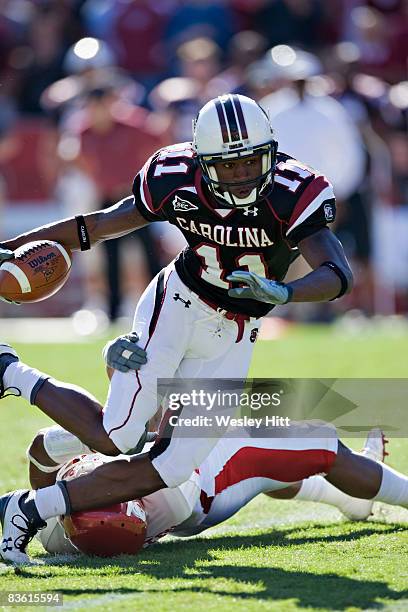 Kenny McKinley of the South Carolina Gamecocks is tackled during a game against the Arkansas Razorbacks at Williams-Brice Stadium on November 8, 2008...