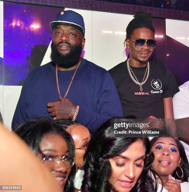 Rick Ross and DJ Sam Sneak attend a Party at Gold Room on August 18, 2017 in Atlanta, Georgia.