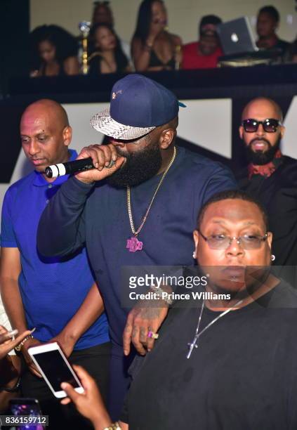 Alex Gidewon, Rick Ross and Kenny Burns attend a Party at Gold Room on August 18, 2017 in Atlanta, Georgia.