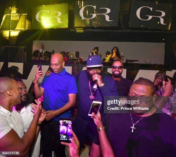 Alex Gidewon, Rick Ross and Kenny Burns attend a Party at Gold Room on August 18, 2017 in Atlanta, Georgia.