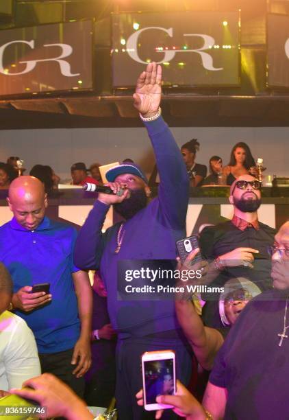 Alex Gidewon, Rick Ross and Kenny Burns attend a Party at Gold Room on August 18, 2017 in Atlanta, Georgia.