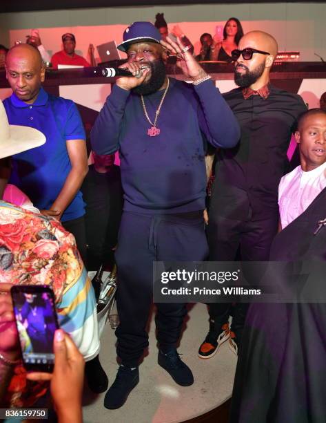 Alex Gidewon, Rick Ross and Kenny Burns attend a Party at Gold Room on August 18, 2017 in Atlanta, Georgia.