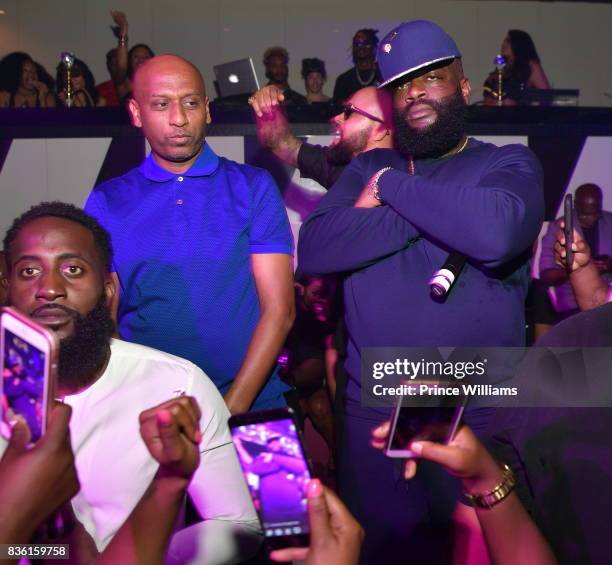 Alex Gidewon, Rick Ross and Kenny Burns attend a Party at Gold Room on August 18, 2017 in Atlanta, Georgia.