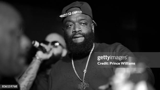 Rick Ross and Kenny Burns attend a Party at Gold Room on August 18, 2017 in Atlanta, Georgia.