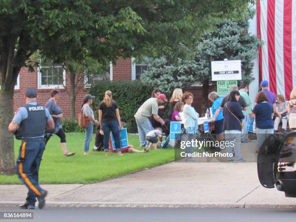 Fair Lawn Police watch over the rally and provide security during Women of Action New Jersey Rally for Unity and Peace with Mayor, Councilwoman, full...