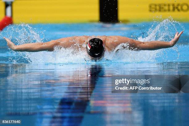 Singapore's Joseph Schooling competes in the men's 50m butterfly swimming final of the 29th Southeast Asian Games at the National Aquatics centre in...