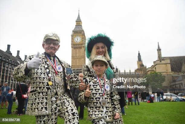 Pearly King, Queen and Prince are gathered at Parliament Square to hear the Big Ben's world famous 'bongs' for the final time for four years, in...