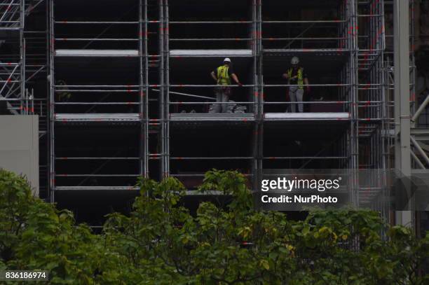 Workers are seen on the scaffoldings while works on the facade of the Elizabeth Tower, commonly known as Big Ben, London on August 21, 2017. Big Ben...