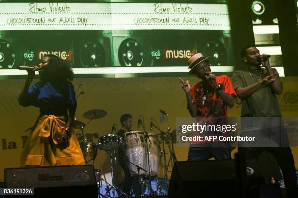 Colombian singers Gloria "Goyo" Martinez , Miguel "Slow" Martinez and Carlos "Tostao" Valencia, members of the Afro-Colombian band Chocquibtown,...