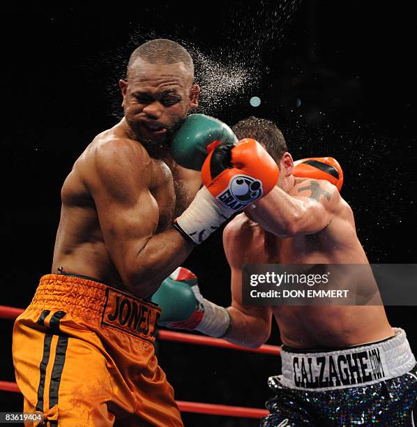 Roy Jones Jr of the US is on the receiving end against Welshman Joe Calzaghe during their light-heavyweight showdown at Madison Square Garden on...