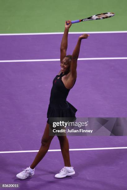 Venus Williams of United States celebrates defeating Vera Zvonareva of Russia in the final during the Sony Ericsson Championships at the Khalifa...
