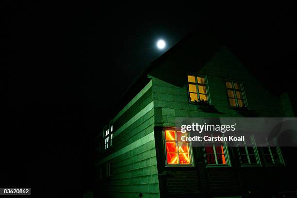 In the window of a house shines an illuminated X, the symbol of the anti nuclear movement on November 9, 2008 in Metzingen near Gorleben, Germany....