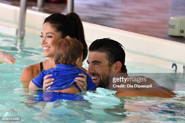 Nicole phelps, Boomer Phelps and Michael Phelps attend the Huggies Little Swimmers #trainingfor2032 Swim Class With The Phelps Foundation on August...